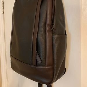 Coach unisex leather backpack.